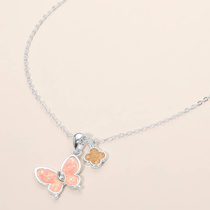 Quatrefoil Butterfly Charm Pendant Necklace for wholesale by Sensibling Corp.