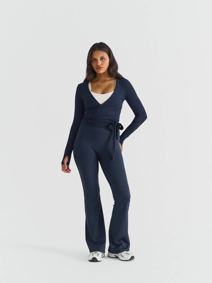 Softsculpt Flared Leggings - Navy for wholesale by Sisterly Tribe