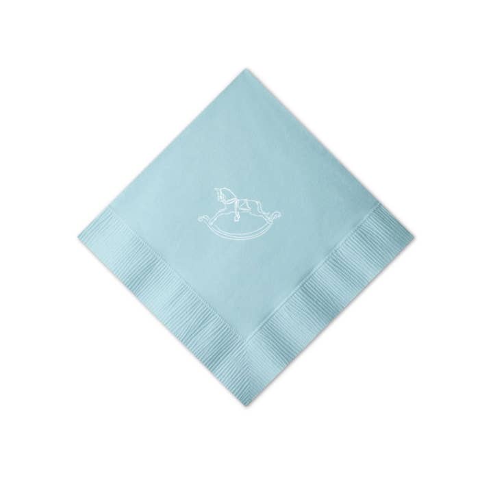 Weißes folienbedrucktes Schaukelpferd auf blauer Cocktailserviette für den Großhandel von Kate Chambers Designs