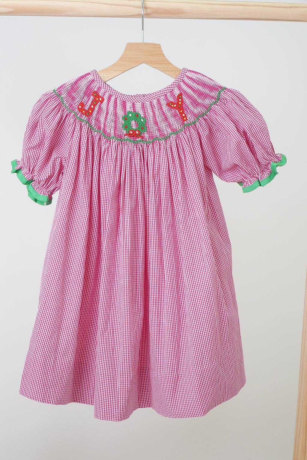 Mom & Co. - Wholesale Dress - Kids - Pink christmas joy hand smocked gingham dress0