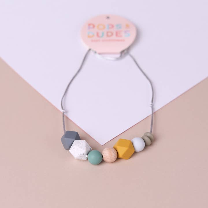 Mustard geo pop teething necklace for wholesale by Pops and Dudes