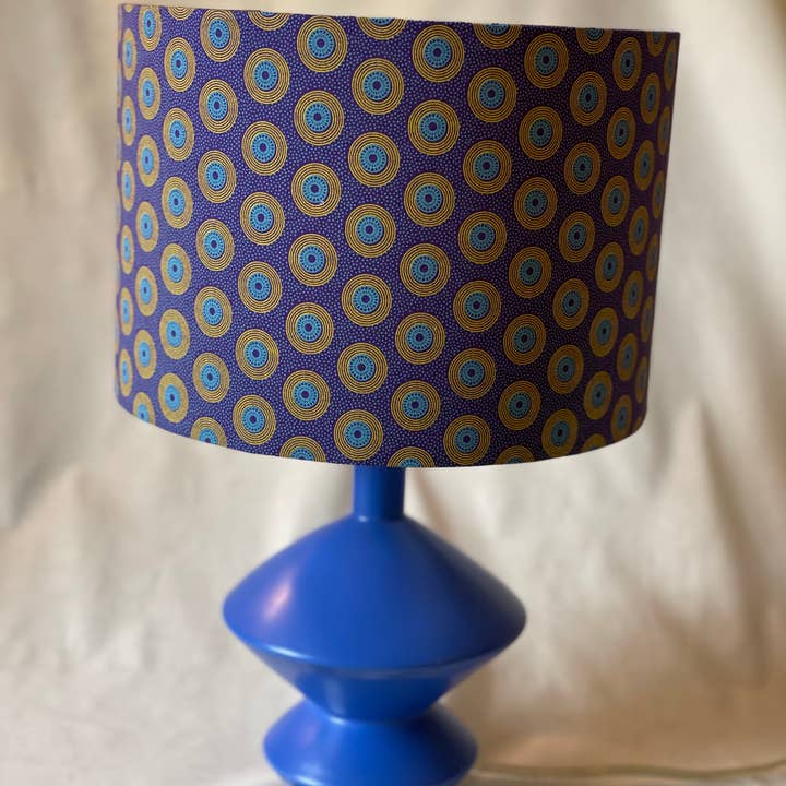 Olive and Limpet - Wholesale Lamp Shade - 10 inch Drum Lampshade. Dynamic South African Shwe Shwe Print- Purple with Teal and Yellow "LP" Motif