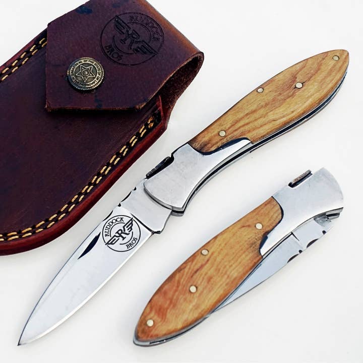 Der Schläger Olivenholz - Edelstahl für den Großhandel von Ruddock Bros. LLC