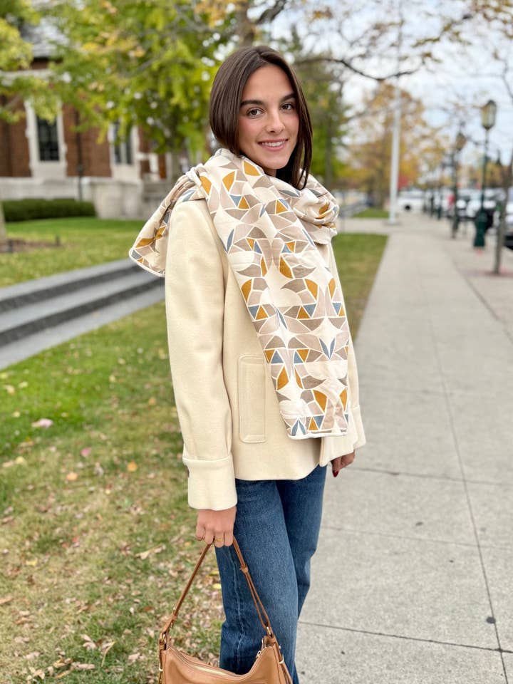 Cream Mollusk Cozy Wrap for wholesale by Beastly Threads