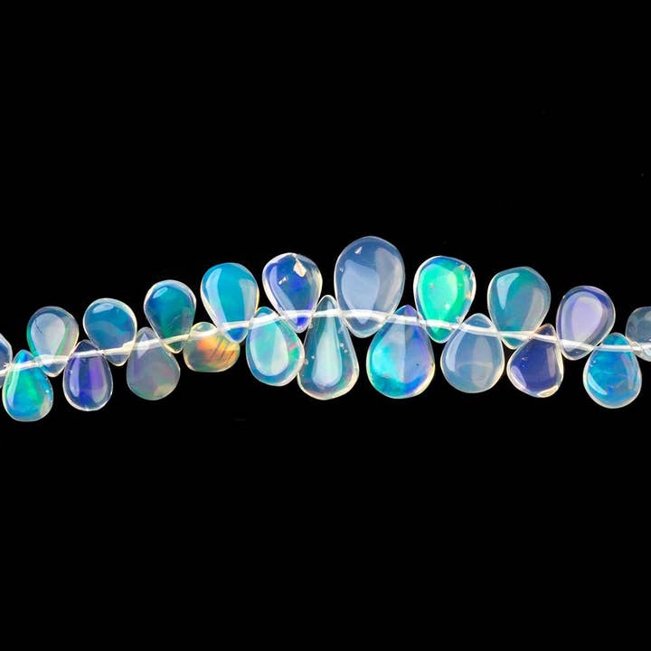 5x4-8x6mm Ethiopian Opal Plain Pear Beads 8 inch 74 pieces for wholesale by Beads of Cambay