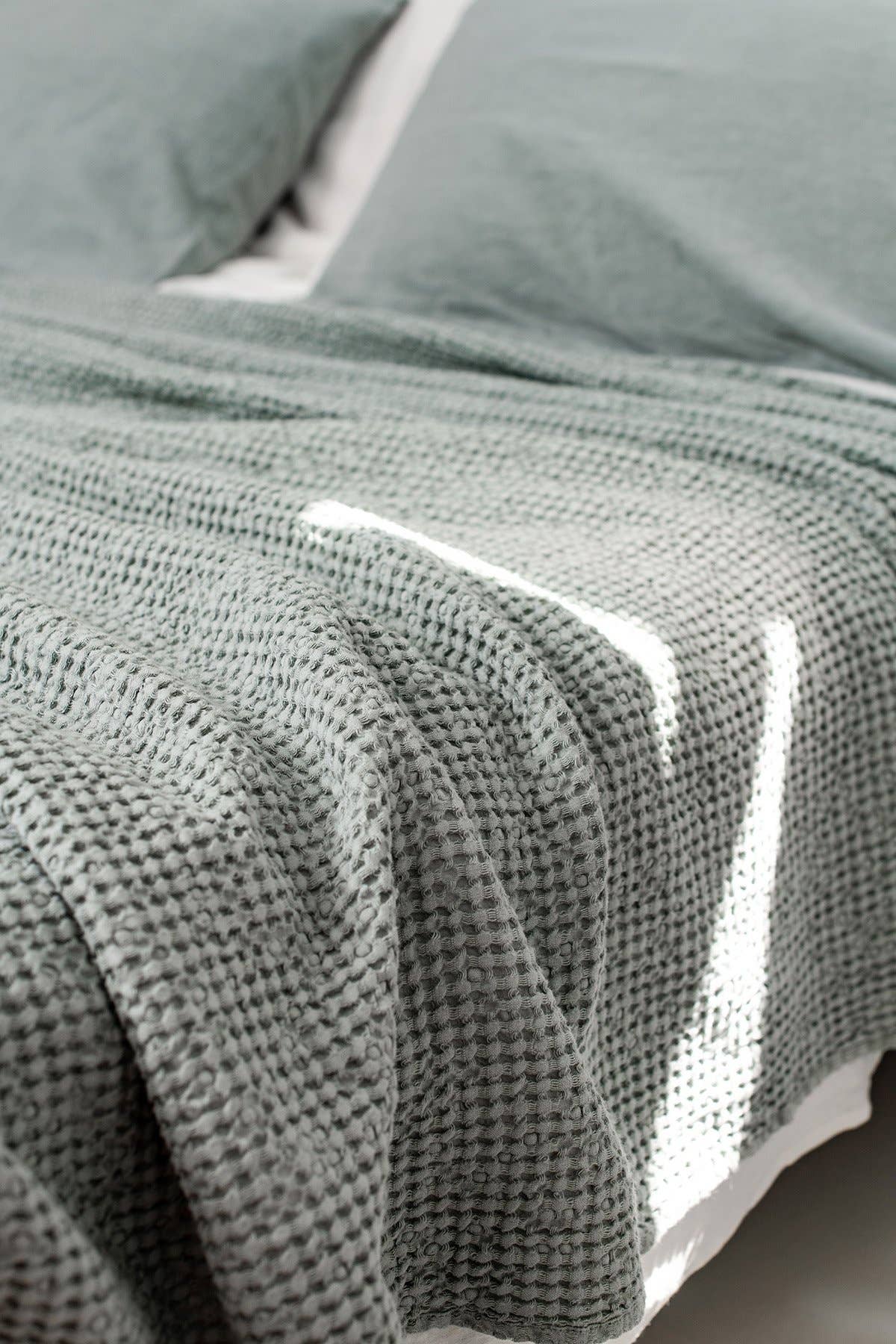 Linen waffle blanket in Sage Green for wholesale on Faire1