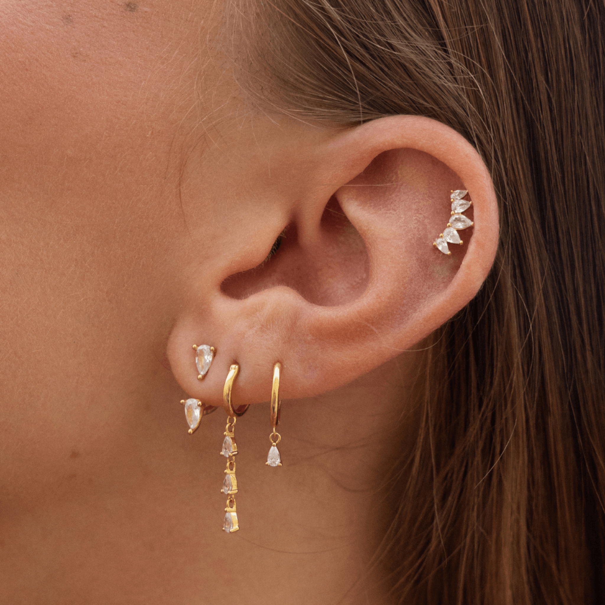 Pohesia – Großhandel Huggie-Ohrring – Zarzis Ohrstecker aus 925 Sterlingsilber mit 24-karätiger Vergoldung4