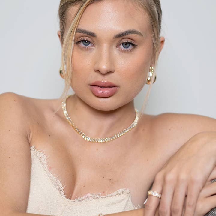 MIA Jewelry – Großhandel Mehrsteinige Ringe – Ring aus gepflasterter Zirkonia im Baguette-Schnitt1