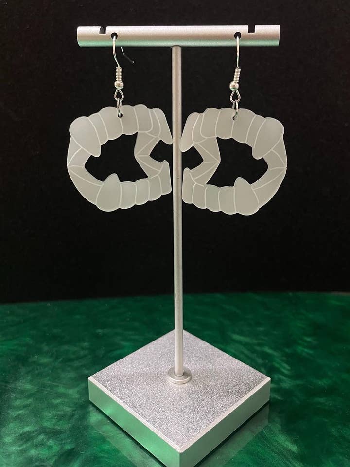 Fangs for wholesale by The Caid Co