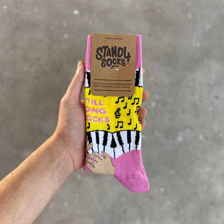 Multi Elton John "Still Standing" for wholesale on Faire3