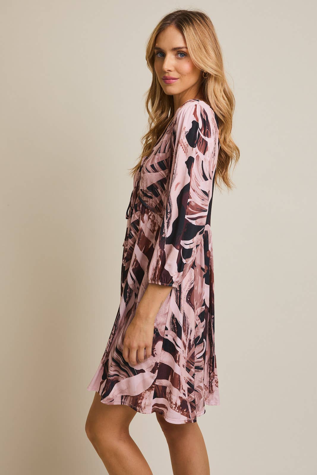 V-NECK FRONT TIE LONG SLEEVE ABSTRACT MINI DRESS for wholesale on Faire1