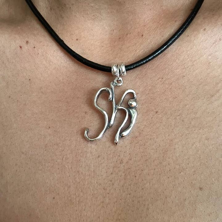 Esquí - Collar de plata de ley con cuero para venta al por mayor de Stylized Heritage - Word Art Jewelry