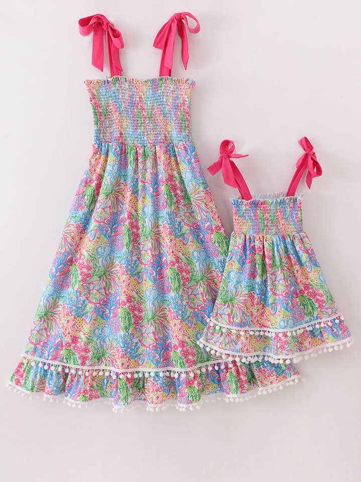 Pink tropical floral smocked mom&me dress for wholesale by Mom & Co.