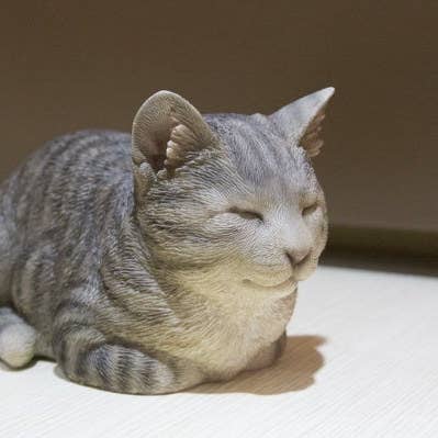 Sleeping Grey Tabby Cat Statue for wholesale by Hi-Line Gift Ltd.