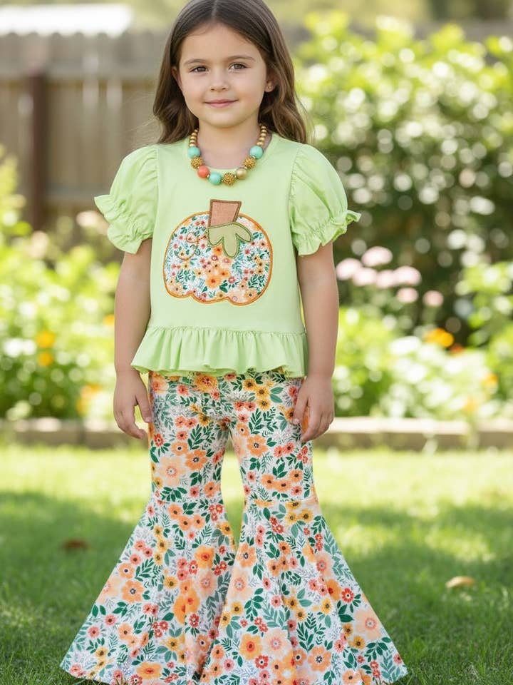 Floral pumpkin application top and bell bottoms. for wholesale by Kids Charm Online