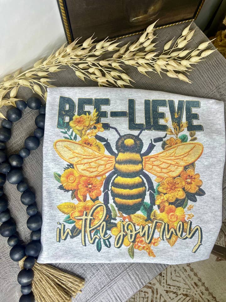 Jerzee Ash Grey Bee-Lieve In The Journey (Sublimation T-Shirt) for wholesale on Faire