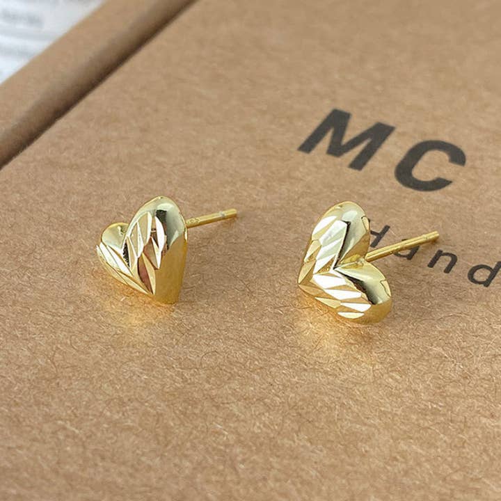 Dainty Tiny Gold Heart Stud Earrings in 925 Sterling Silver for wholesale by Perimade & Co. LLC
