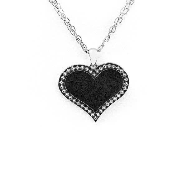 Collier en argent sterling avec cœur en cuir Rebel Punk pour la vente par Cynthia Gale New York