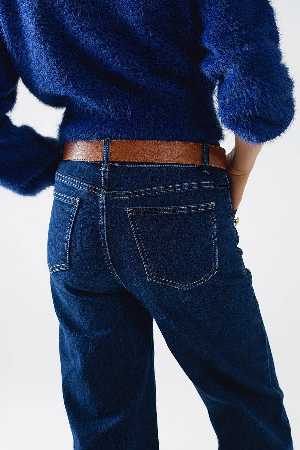 Blue Wide leg jeans with 3 button detail for wholesale on Faire4