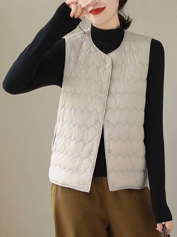 Loose Sleeveless Buttoned Quilted Solid Color Round-Neck Padded Vest for wholesale by VividLux