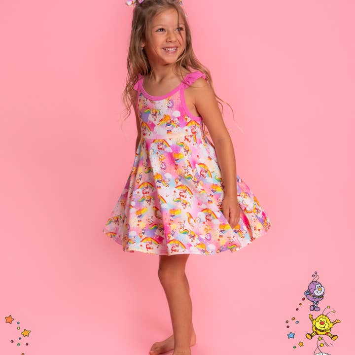 Regenboog Brite™ Babypopjurk voor wholesale door Sweet Peas Co