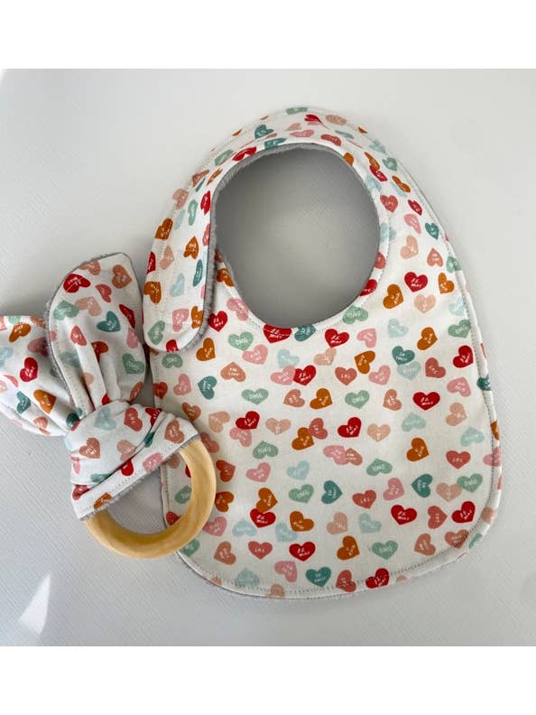 Conversation Hearts bib for wholesale by Port & Starbird