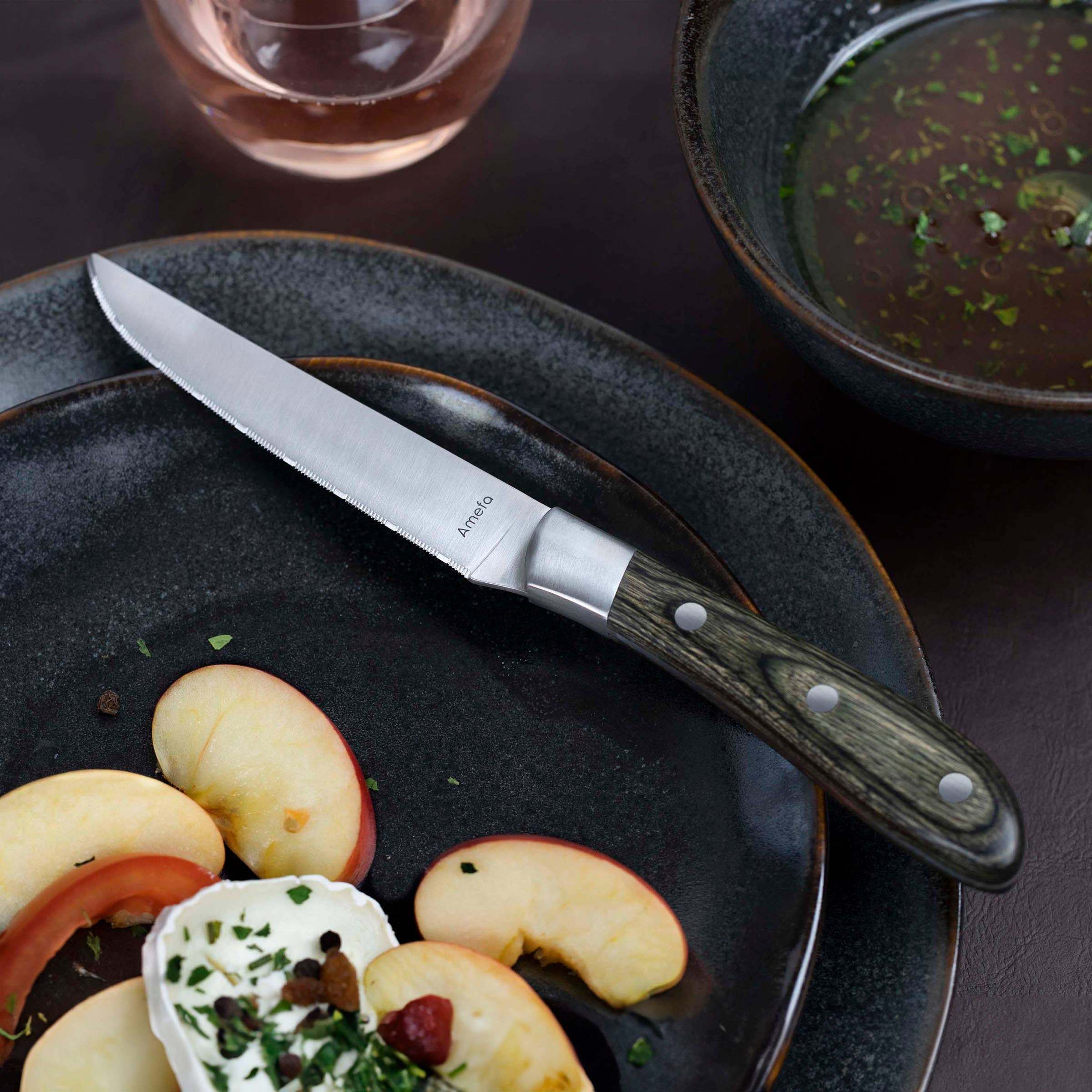 Amefa Couzon - Venta al por mayor Juego de cuchillos - Achille - Juego de 4 cuchillos para bistec con mango de madera Pakka1