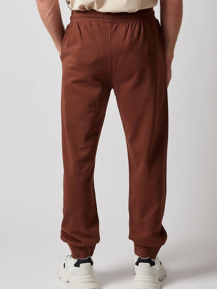 Geborstelde joggingbroek van gecertificeerd biologisch katoen voor wholesale door OWN OFF WITH NATURE