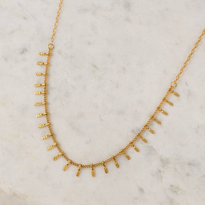 Gold Cyrus Necklace for wholesale on Faire