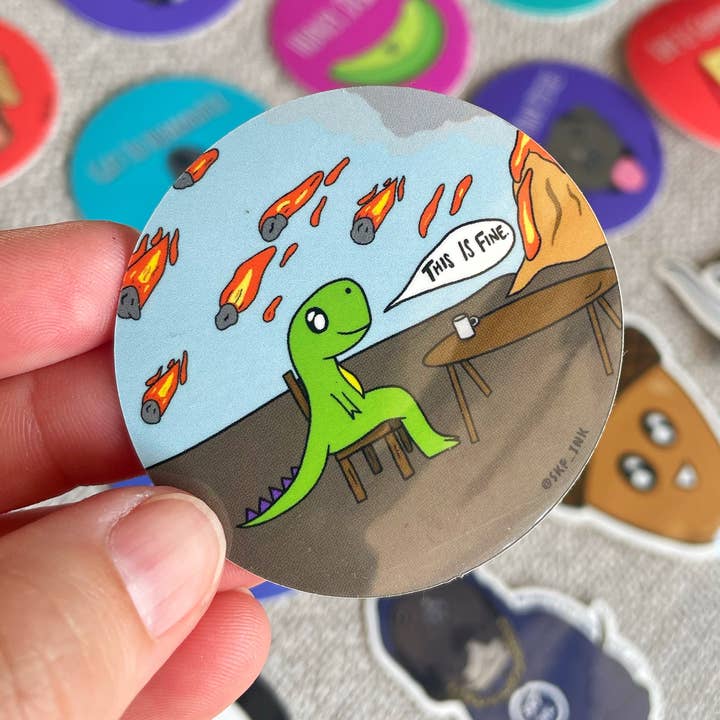 This is Fine | 2 inch Vinyl Dinosaur Apocalypse Sticker for wholesale by SKP ink