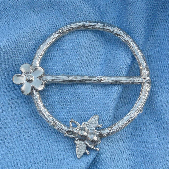 Bee and Daisy Pewter Scarf Ring. Hand Cast by William Sturt for wholesale by William Sturt Fine Pewter
