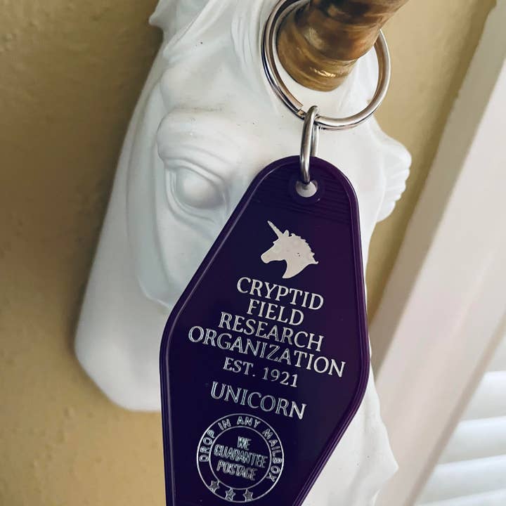 Motel Key Fob - Cryptid Field Research Org. (Unicorn) for wholesale by The 3 Sisters Design Co.