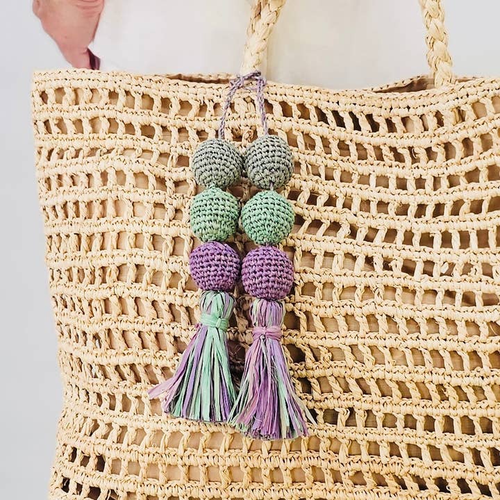 Ciondolo per borsa in rafia blu pastello e lavanda per la vendita all'ingrosso da parte di Baldiz