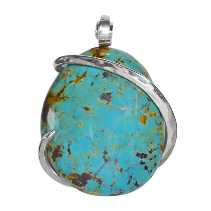 Tyrone Turquoise Handmade Stone Pendant Wrapped in Silver for wholesale by by Isabella Roth