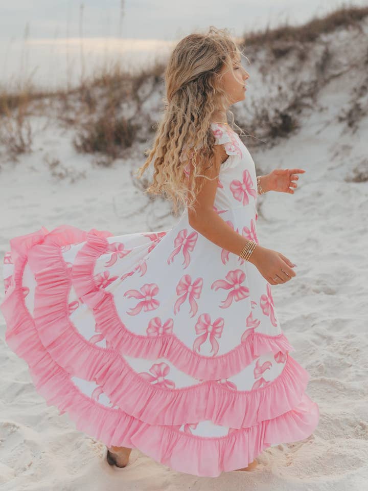Kids Bella Pink Bow Flutter Sleeve Ruffles Spring Dress for wholesale by Oopsie Daisy