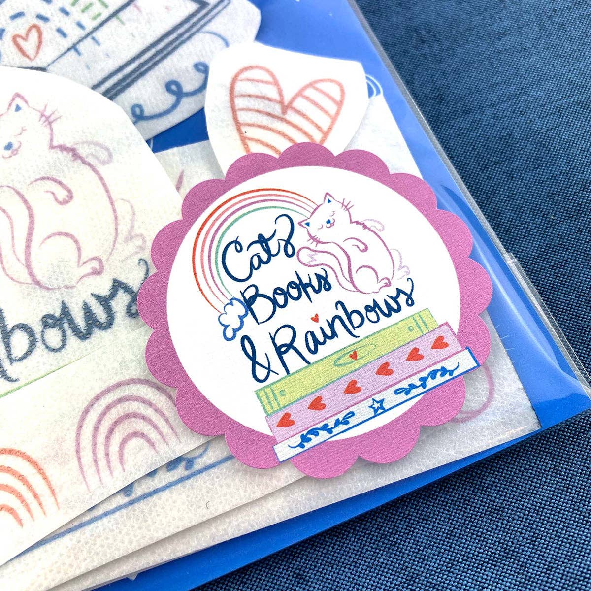 Keller Design Co. - Wholesale Embroidery/Cross Stitch Supplies - Stick It Stitch It Water Soluble Embroidery Patterns-Cats, Books, Rainbows7