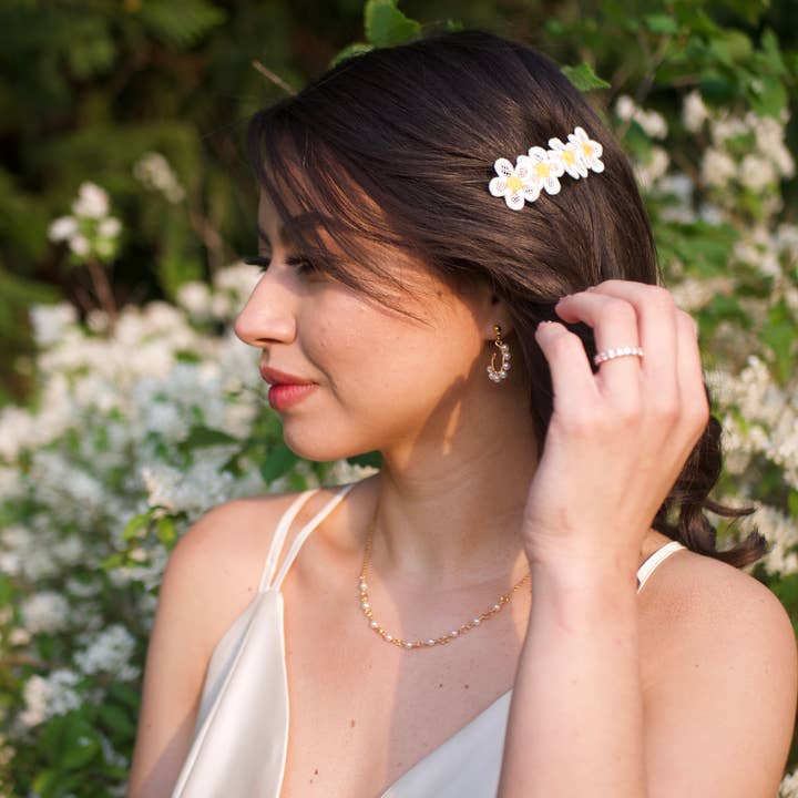 Nanda flower clip for wholesale by karine lascaux