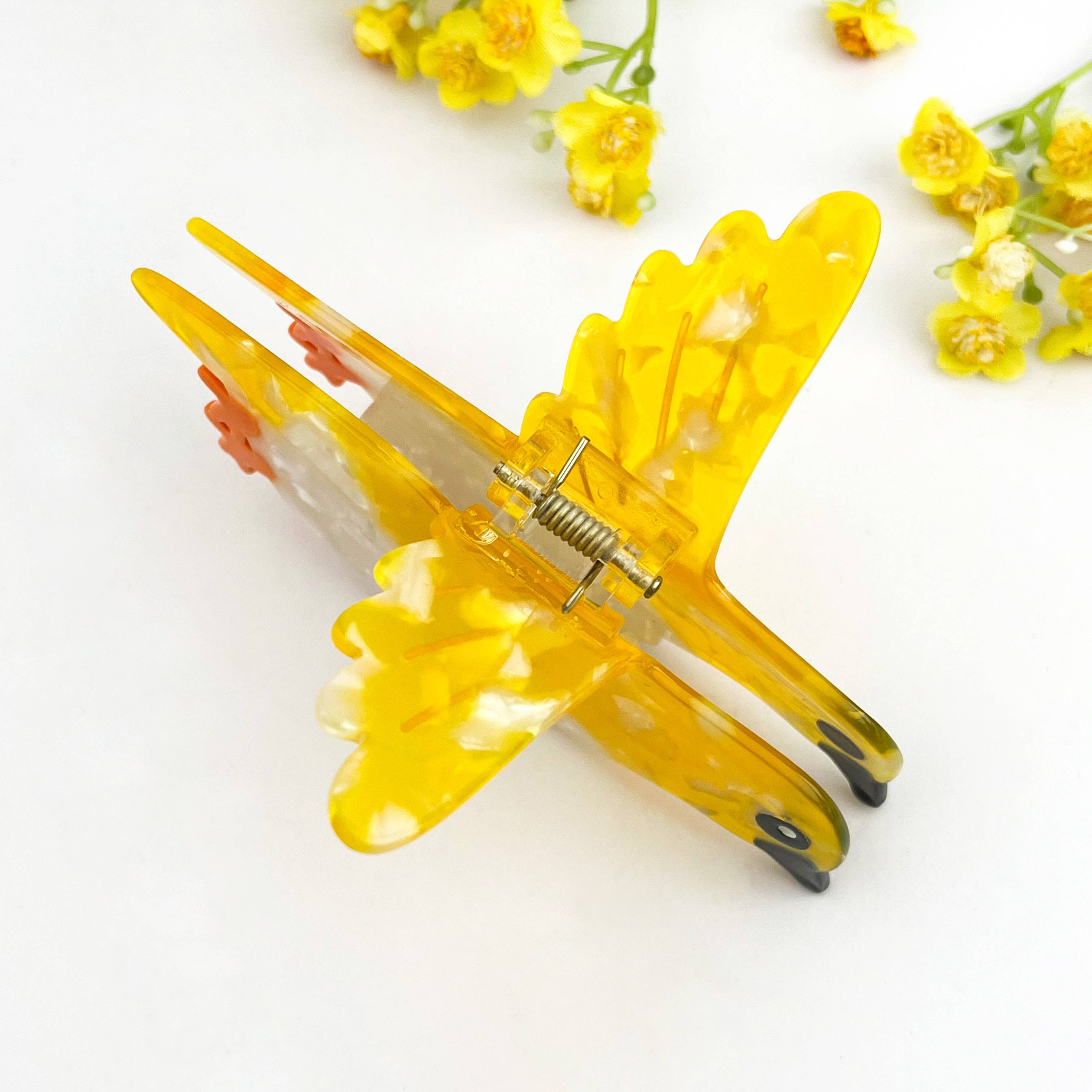 Flying Yellow Oriole Acetate Animal Hair Claw Clip for wholesale on Faire3