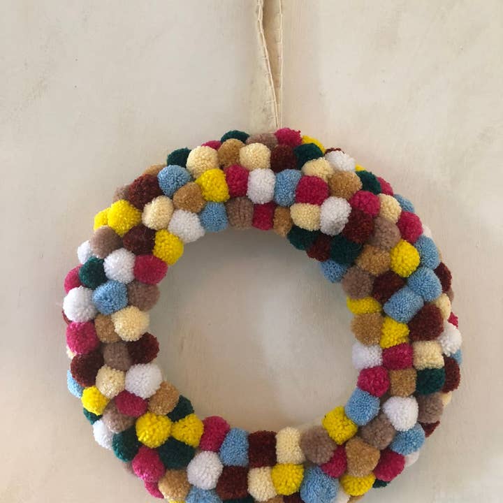 Ghirlanda natalizia con pompon per la vendita all'ingrosso da parte di Hastshilp