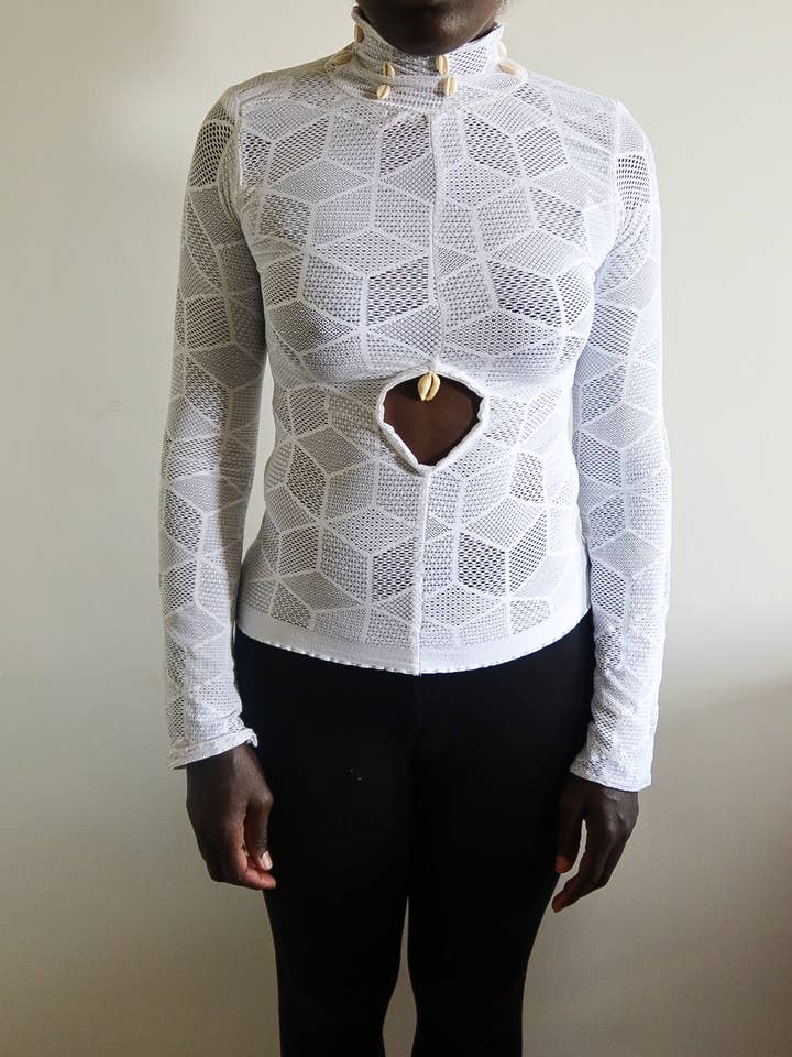 Women's white turtleneck top
for wholesale by Esson