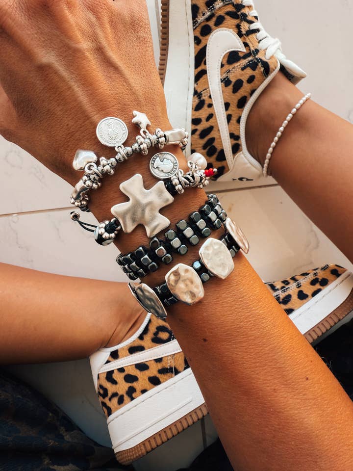 Silver and black bracelet stack with cross and stars for wholesale by Goupi