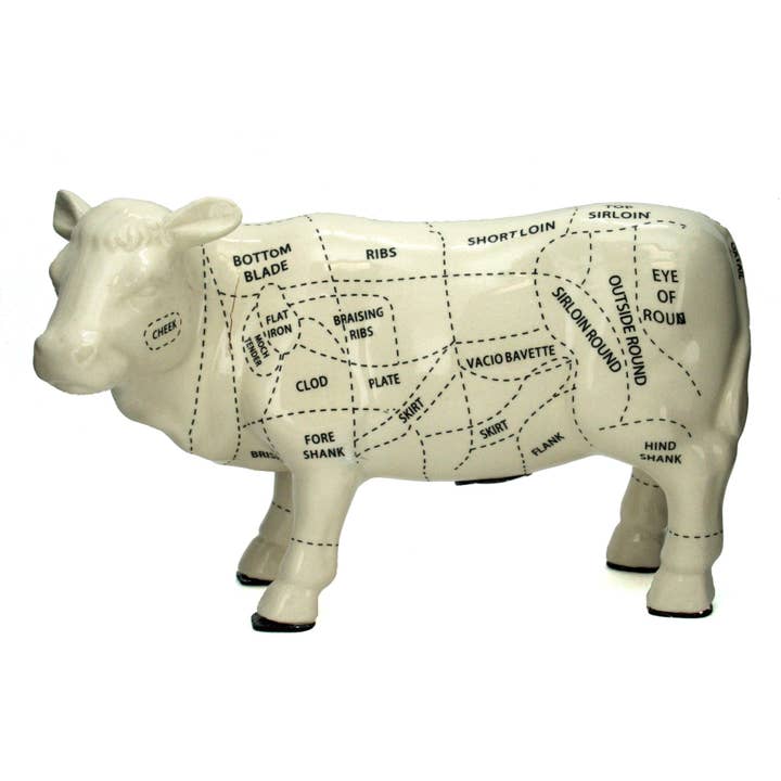 Small White Ceramic Cow cuts bank for wholesale by Housewares & Tabletops by Contrast Inc.