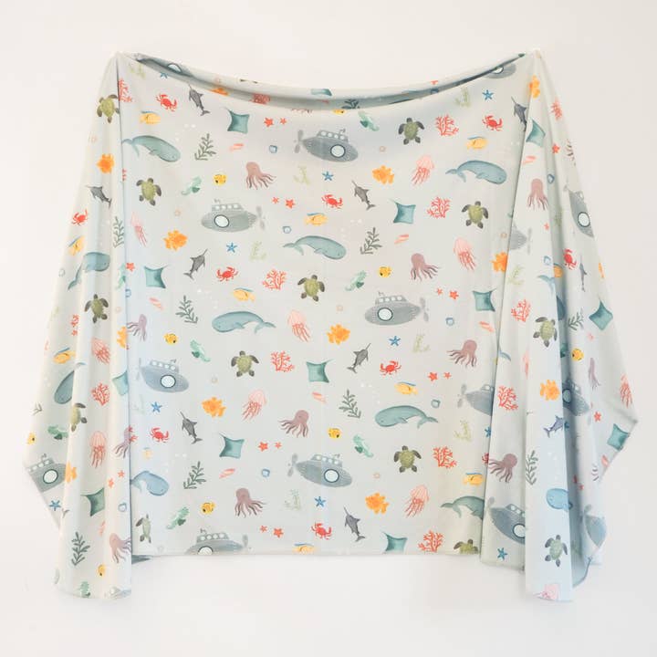 Extra Soft Stretchy Knit Swaddle Blanket: Underwater Adventure for wholesale by Village Baby