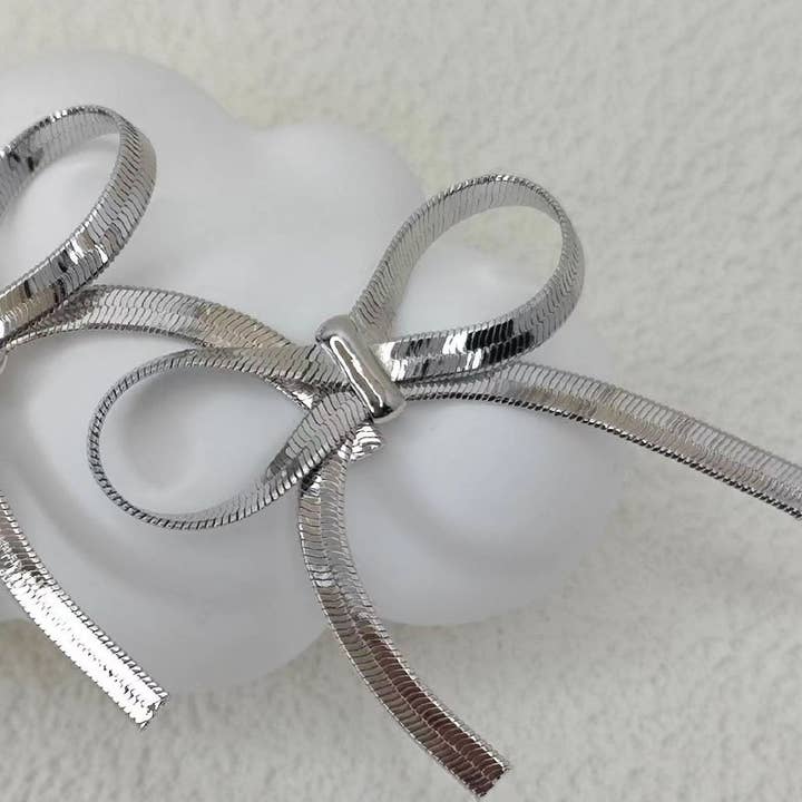 NINEXIS - Wholesale Dangle Earrings - CWAJE1209_THE BOW IS STUD 18K GOLD PLATED EARRINGS