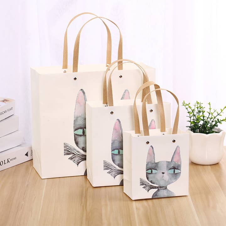 Beige INS STYLE SMALL FRESH CAT PAPER HANDBAG GIFT BAG_CWMM1036 for wholesale on Faire7