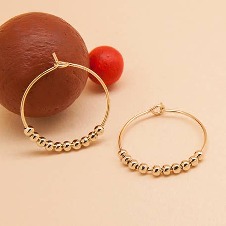 Orecchini a cerchio CIRCLE PM per la vendita all'ingrosso da parte di LES FEMMES A BARBES