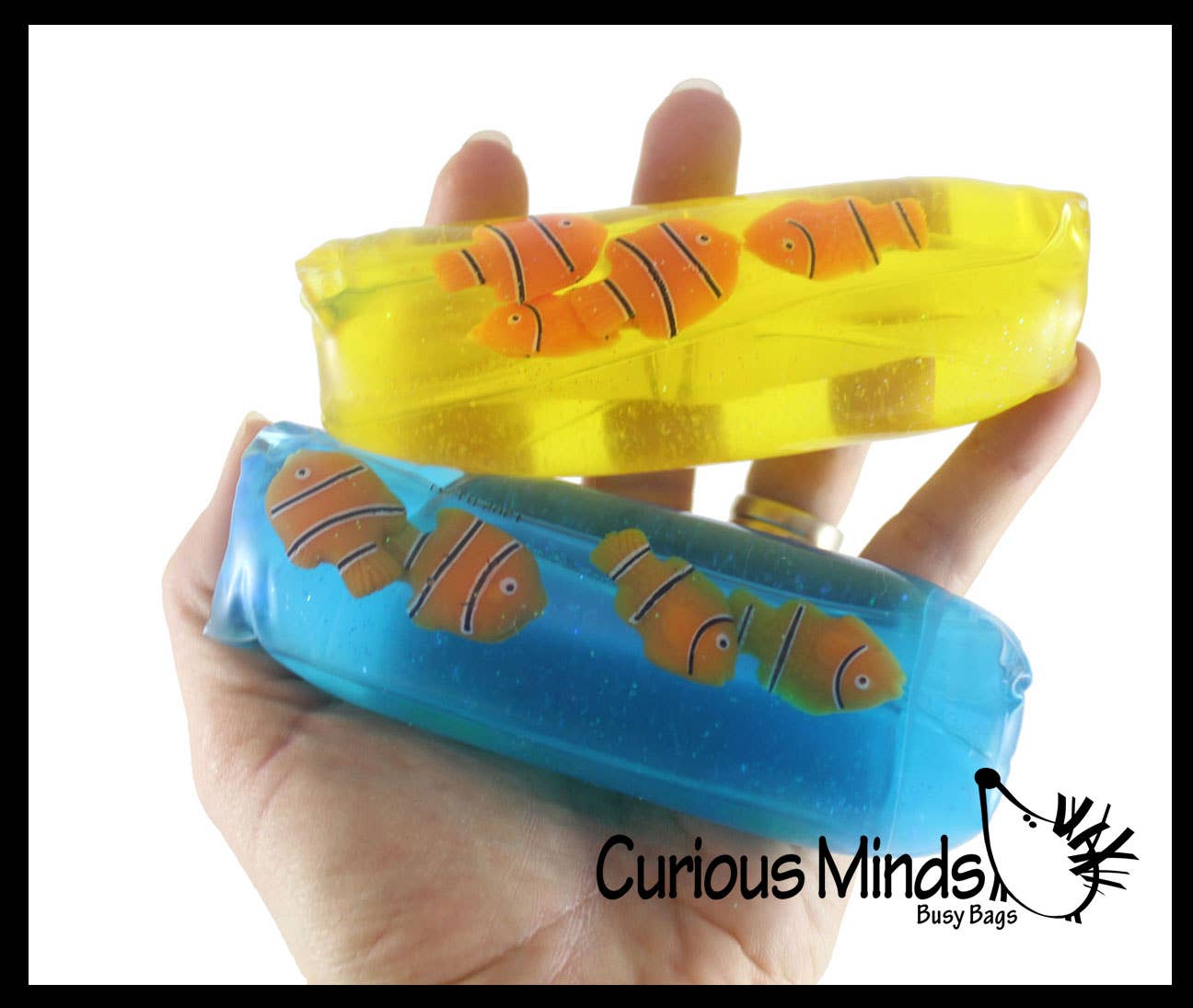 Curious Minds Toys - Vente Jouet mou – enfant et bébé - 1 tube rempli d'eau, poisson-clown, animal de mer, serpent0