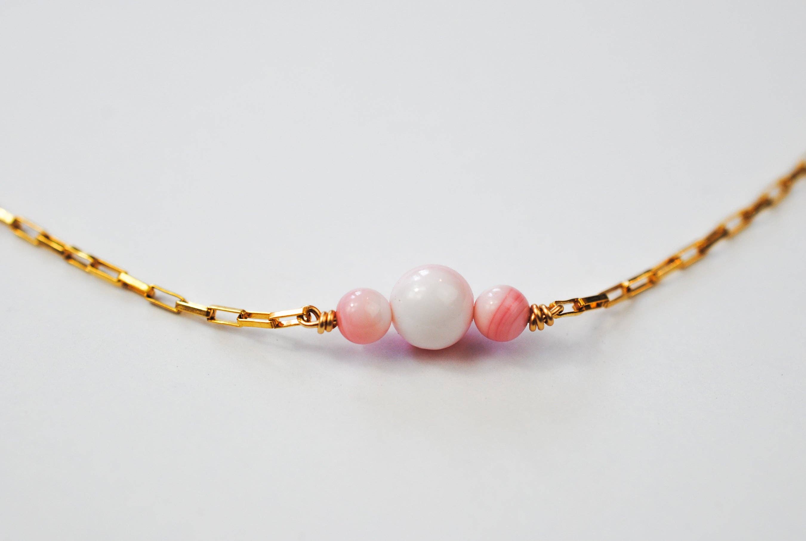 Ripple | Reiki Infused Jewelry - Wholesale Beaded/Pearl Necklace - Queen Conch Genesis Necklace1