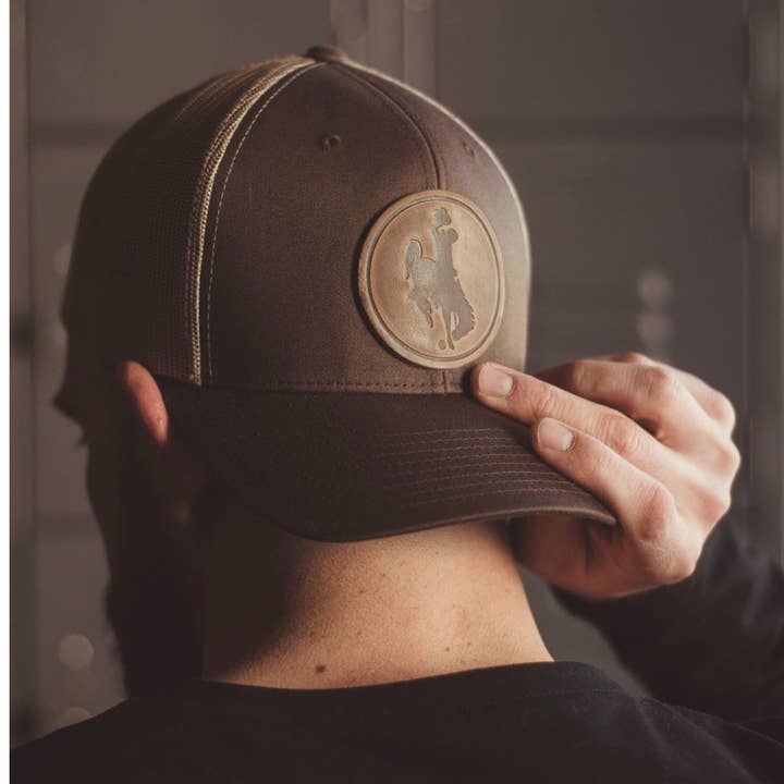 Range Leather Co. - Wholesale Trucker Hat - Unisex - Steamboat Hat - University of Wyoming Leather Patch Hat