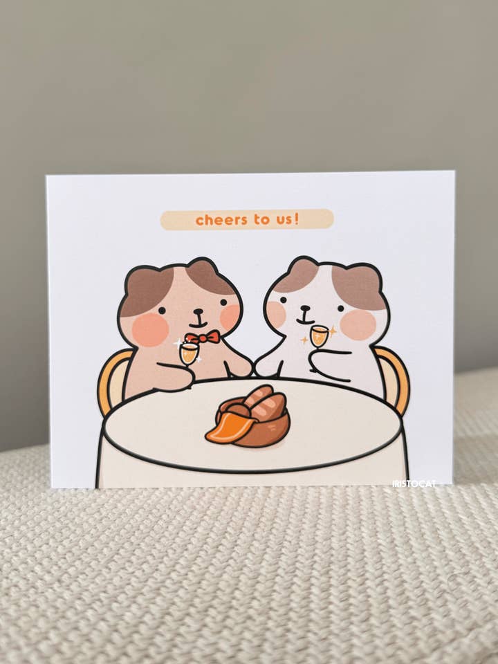 Carte de voeux Cheers To Us pour la vente par iristocat